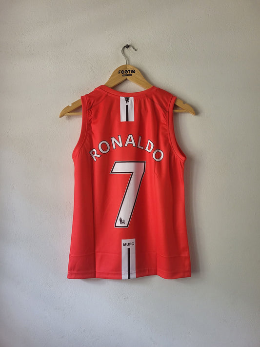 A red sleeveless soccer jersey hanging on a wooden hanger against a plain light gray wall. The back of the jersey features the name 'RONALDO' and the number '7' in white with black outlines, along with white vertical stripes near the collar and hem.