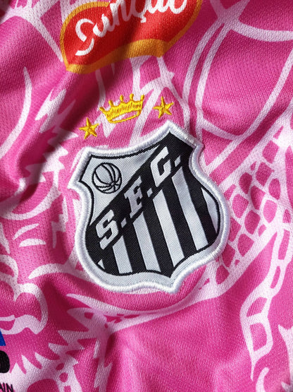 Close-up of a pink patterned soccer jersey with the Santos C.F.